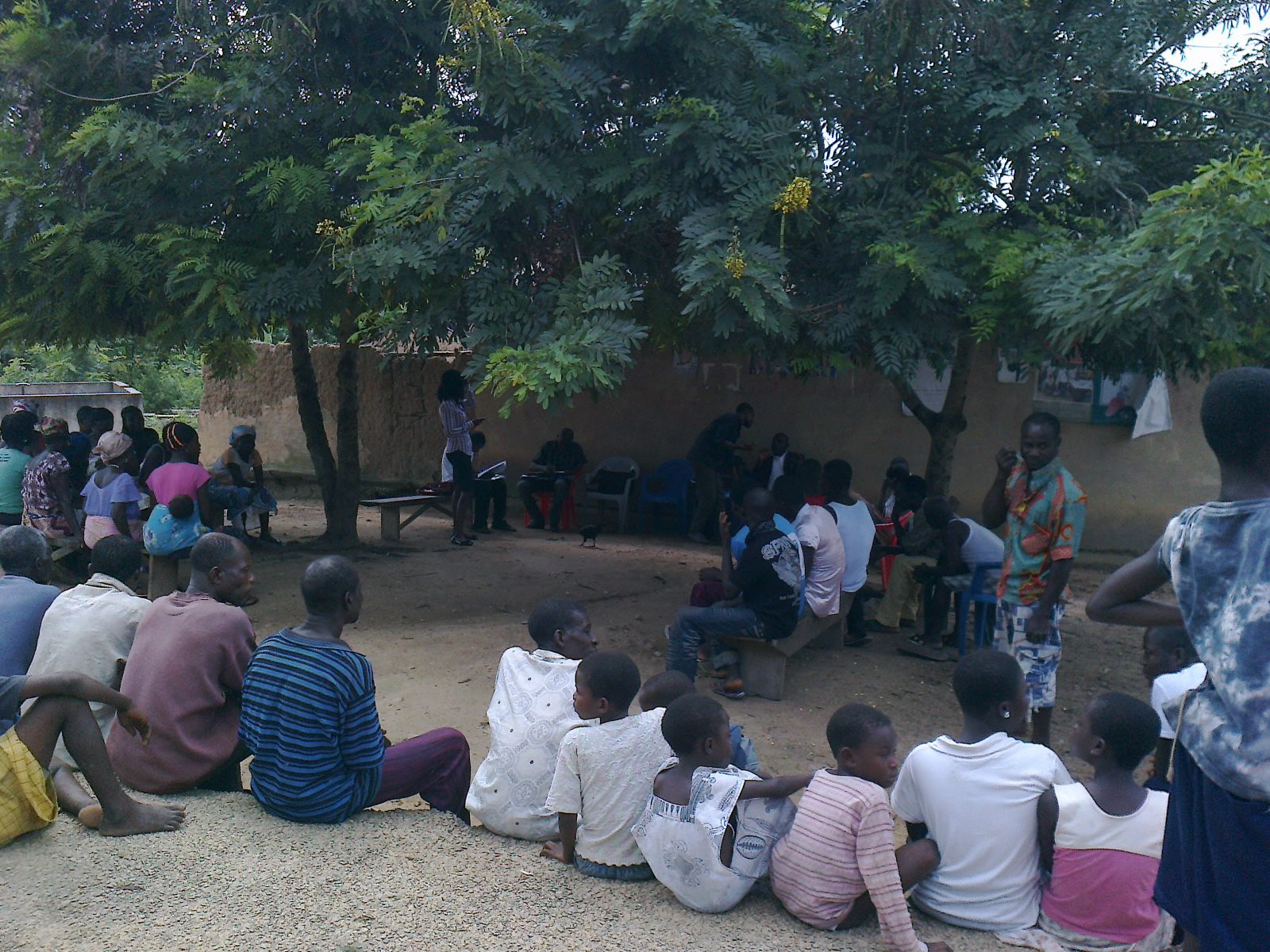 Participatory approach to addressing adolescent health rights among community members. Community engagement, Community leaders listens to adolescents talk about their health rights